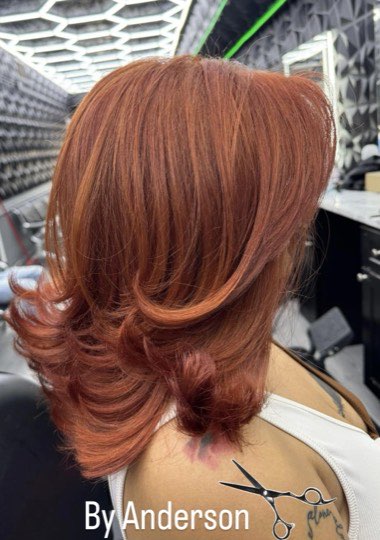 Layered bob with volume dyed copper.