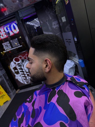 Eyebrows lined up with a razor along with the cut