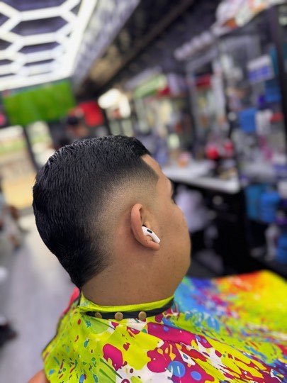 Low taper with the neckline lined up with a razor.