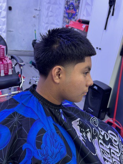 Taper with the top styled up and a straight line up.